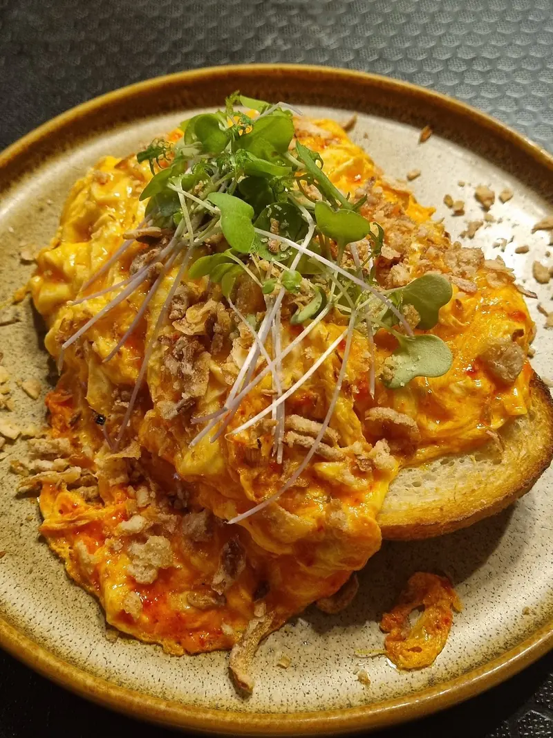 Chilli scramble on thick toast