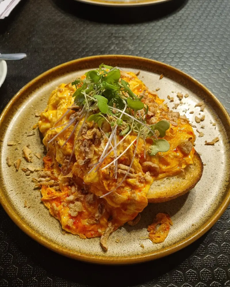 Chilli scramble on thick toast